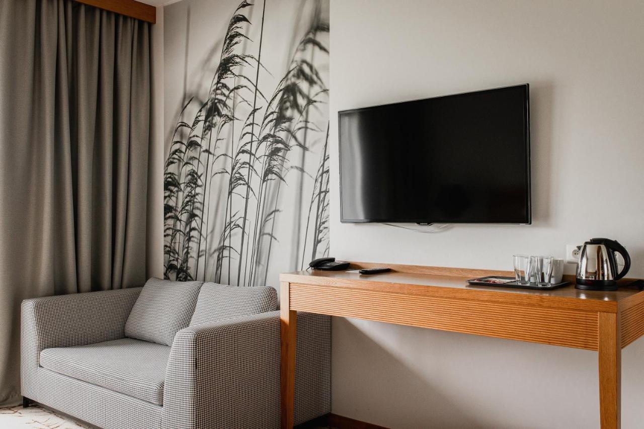 Hotel Marina Club 올슈틴 외부 사진 A television in a hotel room